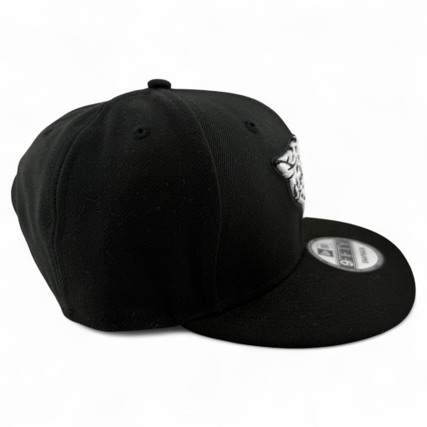 New Era Jacksonville Jaguars NFL Black/White Logo 9Fifty Snapback Adjustable Hat