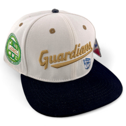 Pro Standard Cleveland Guardians Script Logo Side Patch Ivory/Gold Snapback Hat Cap