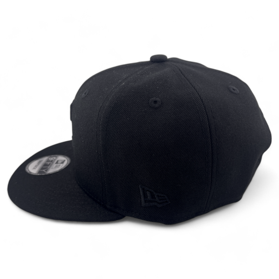 New Era Cleveland Guardians MLB Blacked Out Black Logo 9FIFTY Snapback Hat Cap